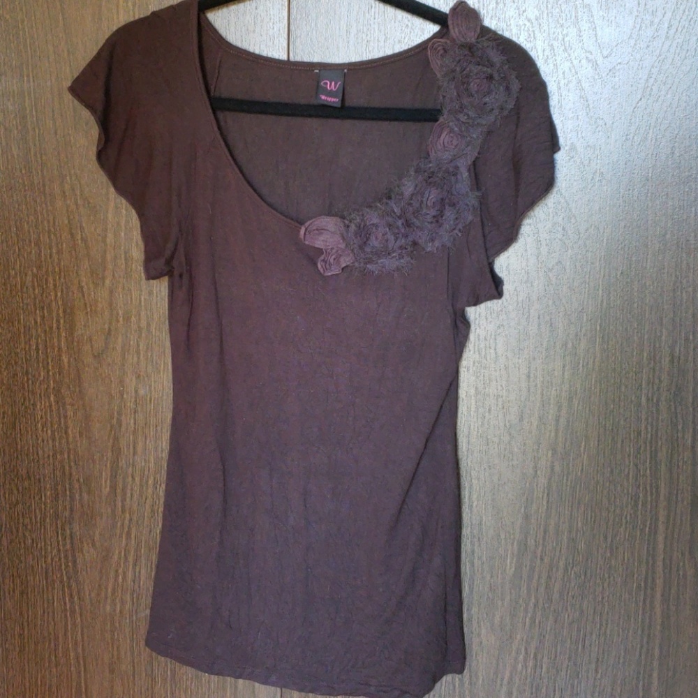 Brown top with floral accent